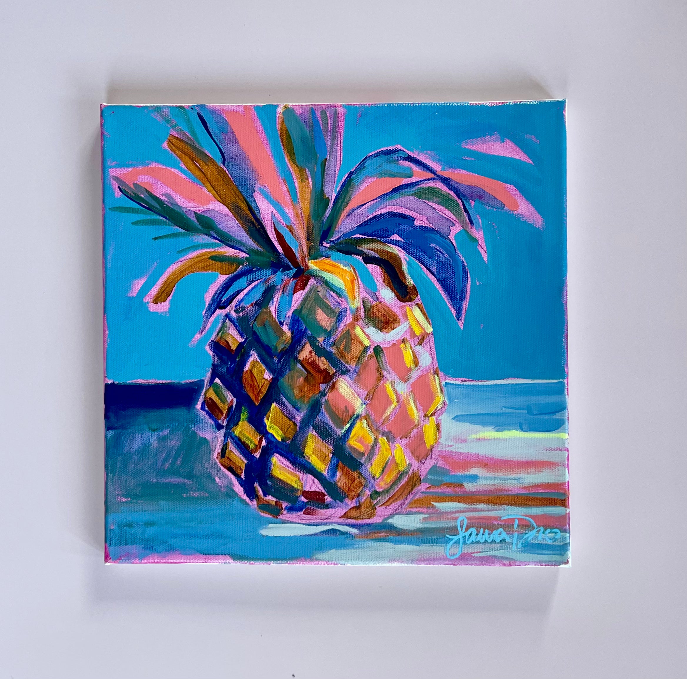 Colorful pineapple artwork vibrant blues and pink colors